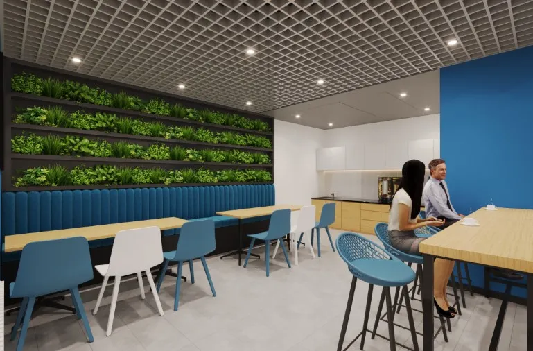 Modern biophilic office design with greenery, wooden tables, and open seating