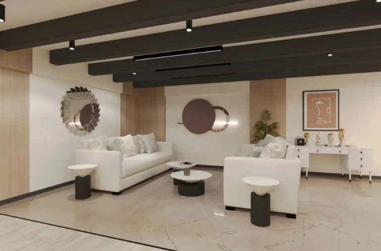 Modern office design with private work pods, open seating, and greenery